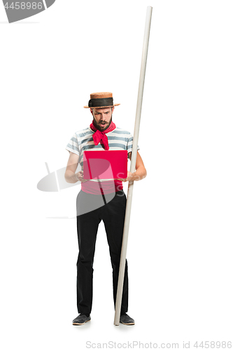 Image of Caucasian man in traditional gondolier costume and hat