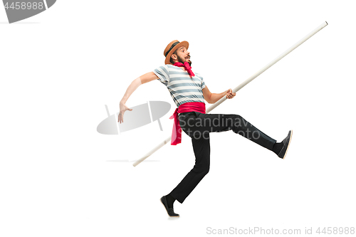 Image of Caucasian man in traditional gondolier costume and hat