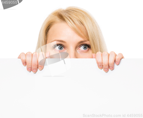 Image of Woman with blank signboard