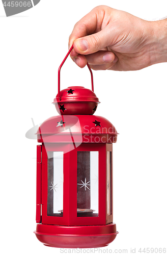 Image of Hand holding red lantern