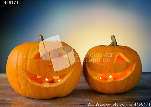 Image of close up of halloween pumpkins on table