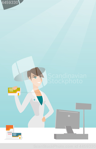 Image of Pharmacist showing some medicine.