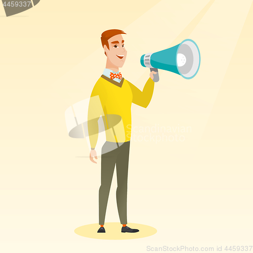 Image of Young man speaking into megaphone.