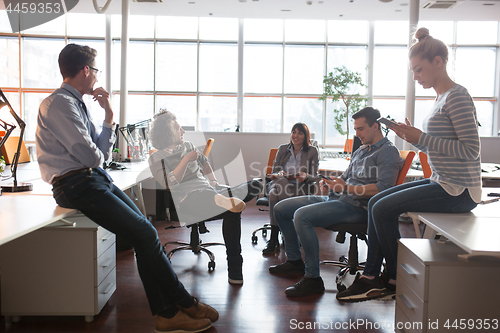 Image of Young Business Team At A Meeting at modern office building