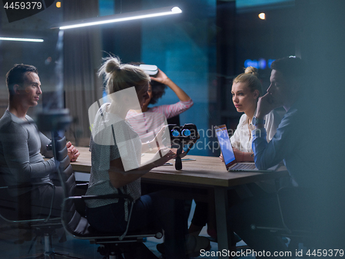 Image of Multiethnic Business team using virtual reality headset