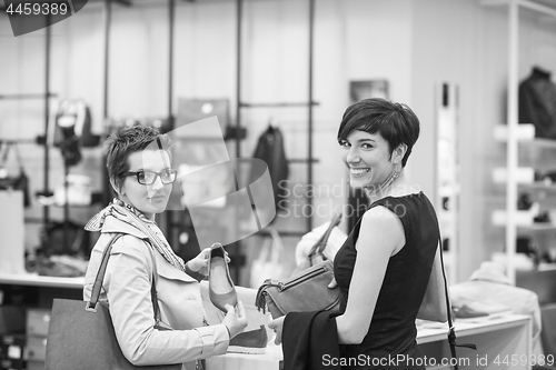 Image of best friend shopping in big mall