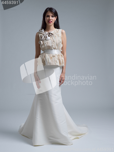 Image of Portrait of beautiful young women in wedding dress