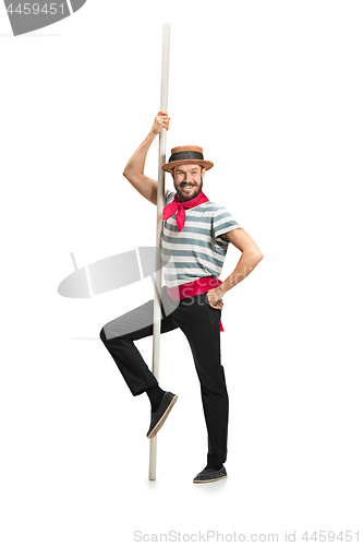 Image of Caucasian man in traditional gondolier costume and hat