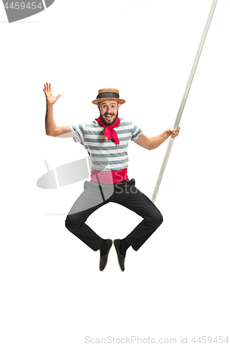 Image of Caucasian man in traditional gondolier costume and hat