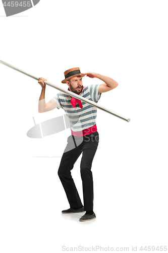 Image of Caucasian man in traditional gondolier costume and hat