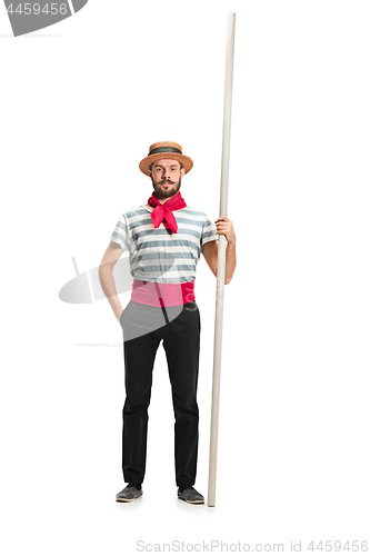 Image of Caucasian man in traditional gondolier costume and hat