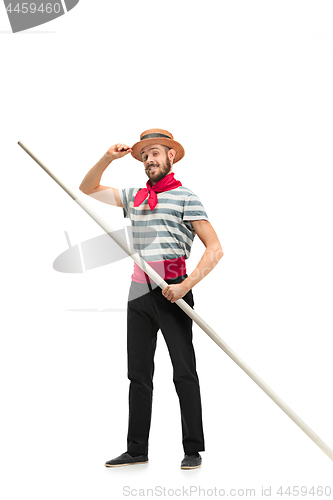 Image of Caucasian man in traditional gondolier costume and hat