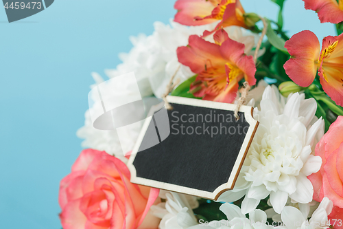 Image of Love background with pink roses, flowers, gift on table