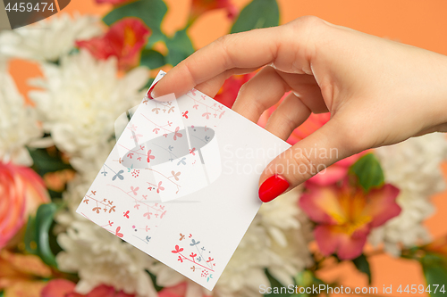 Image of Love background with pink roses, flowers, gift on table