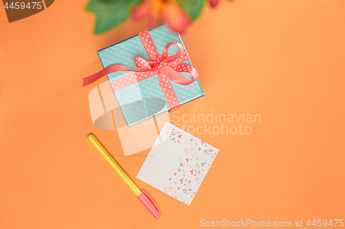 Image of Love background with pink roses, flowers, gift on table