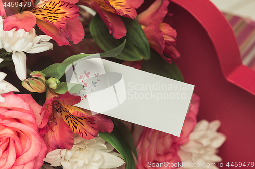 Image of Love background with pink roses, flowers, gift on table