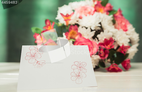 Image of Love background with pink roses, flowers, gift on table