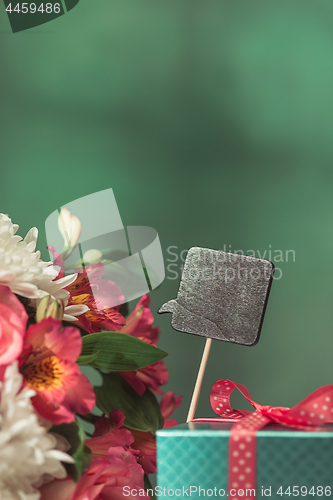 Image of Love background with pink roses, flowers, gift on table