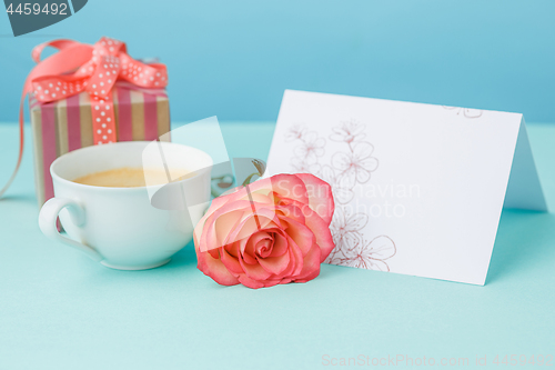 Image of Love background with pink roses, flowers, gift on table