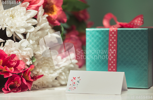 Image of Love background with pink roses, flowers, gift on table