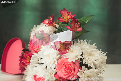 Image of Love background with pink roses, flowers, gift on table