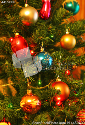 Image of Bright decorations on christmas tree