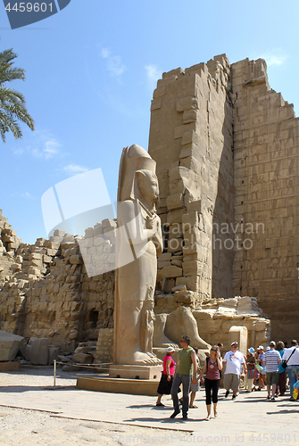 Image of Tourists among the ancient ruins of Karnak Temple in Luxor, Egyp