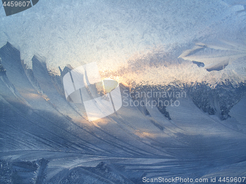 Image of Beautiful ice pattern and sunlight on winter glass