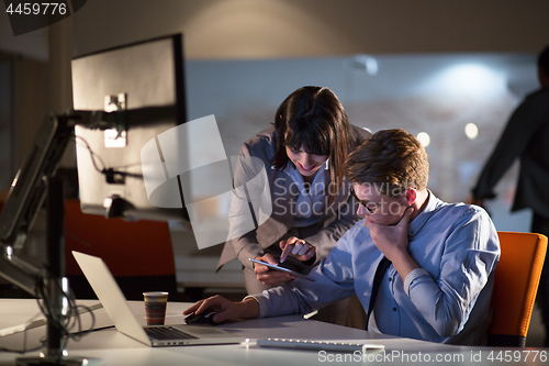 Image of young designers in the night office