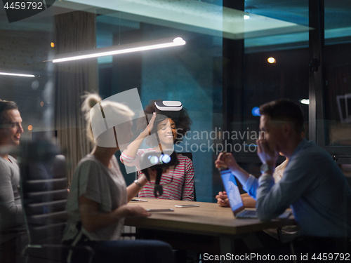 Image of Multiethnic Business team using virtual reality headset