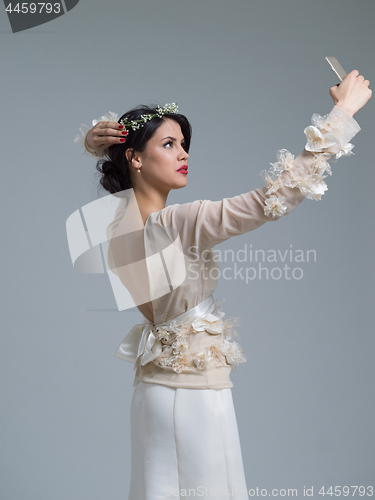 Image of beautiful bride taking a selfie