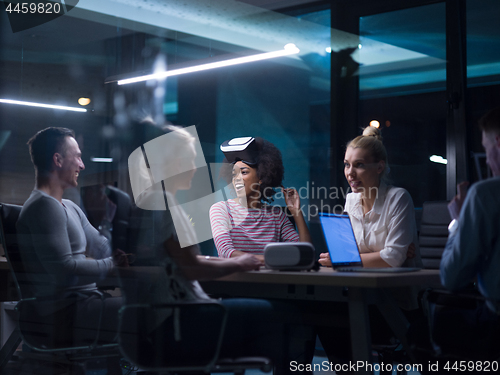 Image of Multiethnic Business team using virtual reality headset