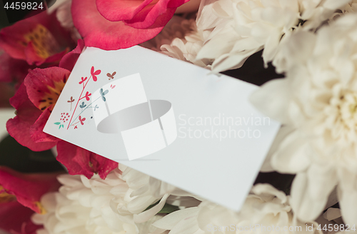 Image of Love background with pink roses, flowers, gift on table