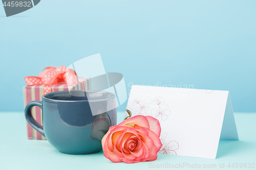 Image of Love background with pink roses, flowers, gift on table