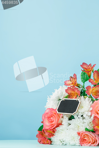 Image of Love background with pink roses, flowers, gift on table