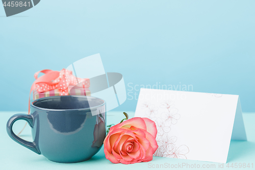 Image of Love background with pink roses, flowers, gift on table