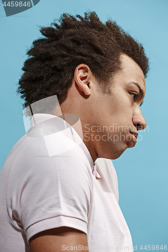Image of Beautiful bored afro man isolated on blue background