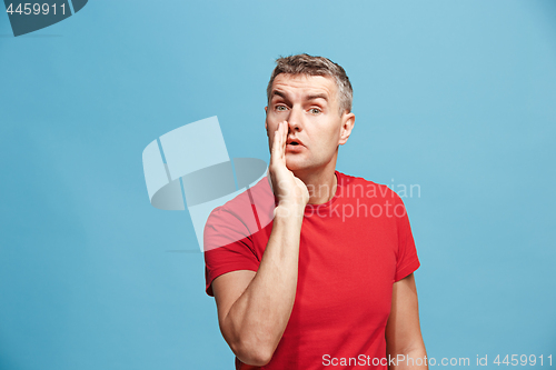Image of Isolated on pink young casual man shouting at studio