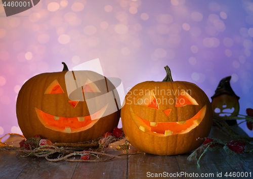 Image of close up of halloween pumpkins on table