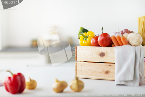 Image of close up of wooden box of fresh ripe vegetables