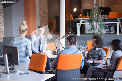 Image of Young Business Team At A Meeting at modern office building