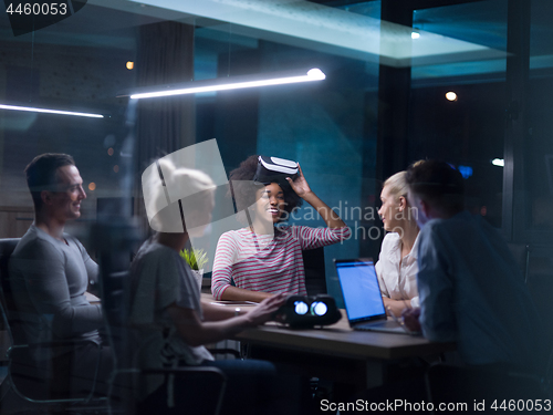 Image of Multiethnic Business team using virtual reality headset