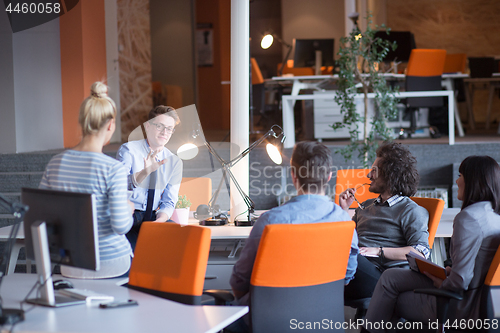 Image of Young Business Team At A Meeting at modern office building
