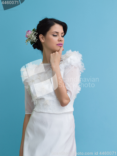 Image of beautiful young women in wedding dress