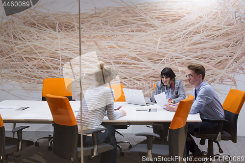 Image of Business Team At A Meeting at modern office building