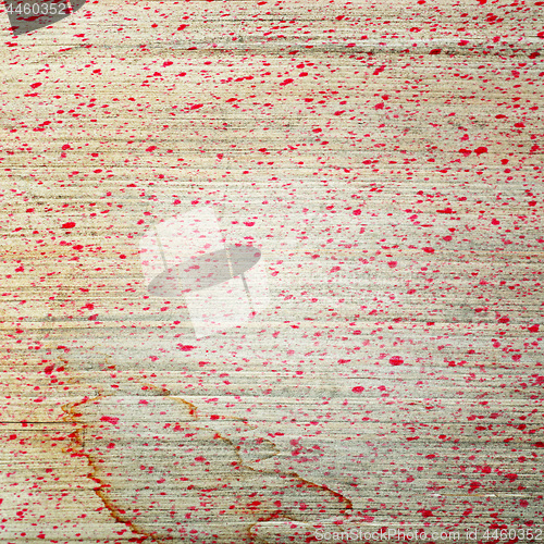 Image of Abstract spotted red dirty grunge paper background.