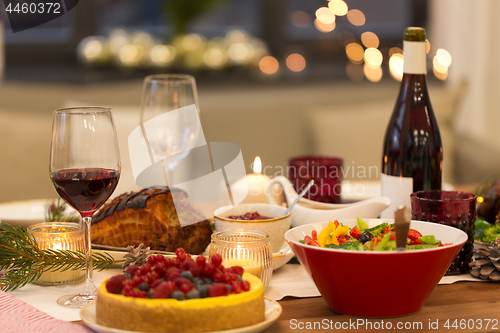 Image of food and drinks on christmas table at home