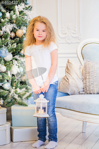 Image of Cute girl and Christmas Tree