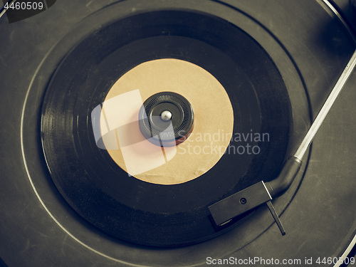 Image of Vintage looking Vinyl record on turntable