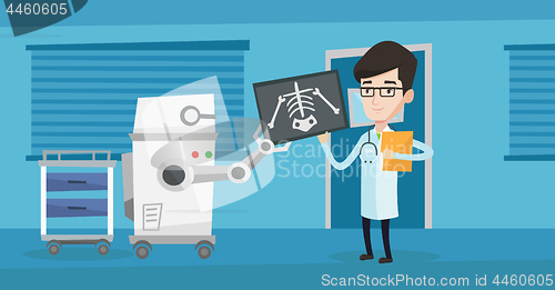 Image of Doctor examining radiograph with help of robot.